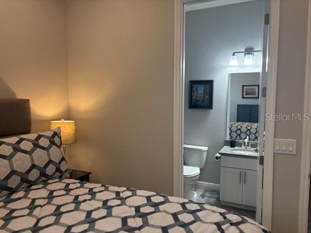 16617 5th Ave E, Bradenton, FL 34212 - bedroom with a sink and connected bathroom