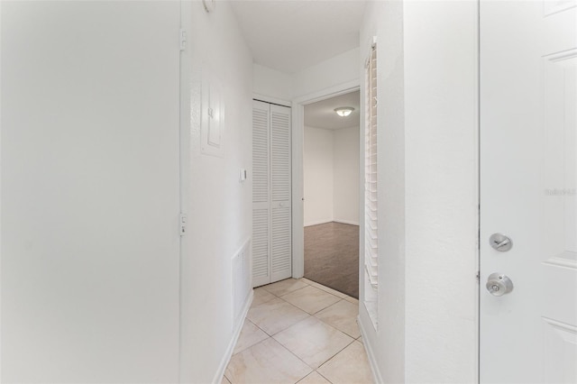 7863 Sugar Bend Dr Unit 7863, Orlando, FL 32819 - hallway with light tile patterned floors