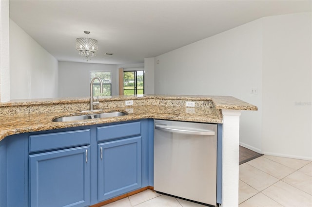 7863 Sugar Bend Dr Unit 7863, Orlando, FL 32819 - kitchen with stainless steel dishwasher, a sink, blue cabinetry, light tile patterned floors, and light stone counters