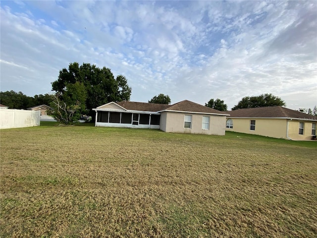 2470 Augusta Way, Kissimmee, FL 34746 - back of property with a sunroom