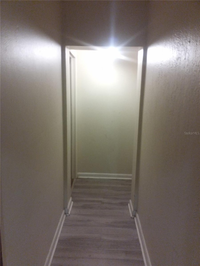 2822 S Dean Rd, Orlando, FL 32825 - corridor featuring wood finished floors and baseboards