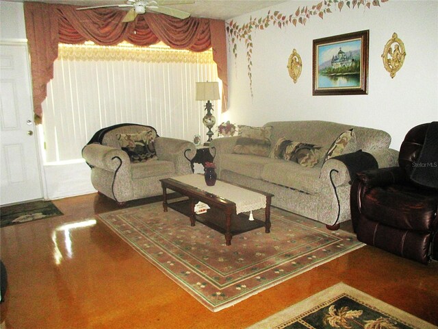 4154 57th St N Unit 272, Kenneth City, FL 33709 - living room featuring a ceiling fan and wood finished floors