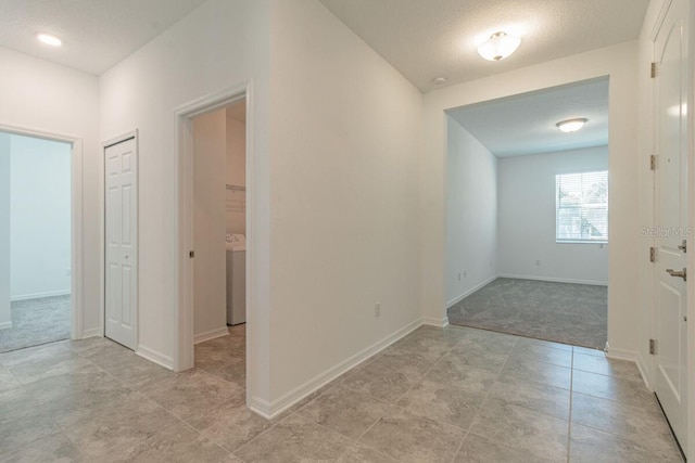 16866 Fiesta Dr, Port Charlotte, FL 33953 - hall with light colored carpet and baseboards