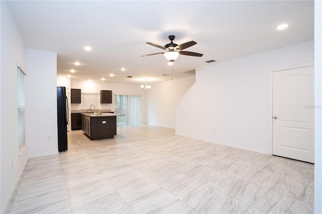 3850 Hampstead Ln, Lakeland, FL 33810 - unfurnished living room with ceiling fan, a chandelier, and recessed lighting