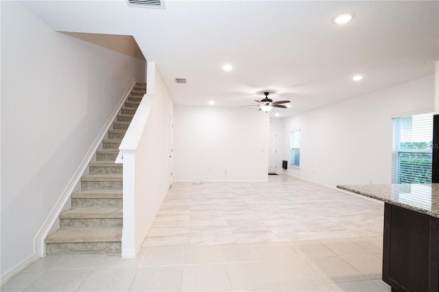 3850 Hampstead Ln, Lakeland, FL 33810 - unfurnished living room featuring stairs, recessed lighting, a ceiling fan, and light tile patterned flooring