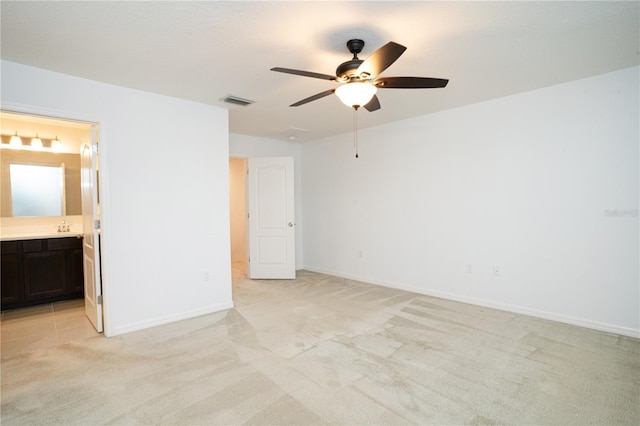 3850 Hampstead Ln, Lakeland, FL 33810 - empty room featuring light carpet and ceiling fan