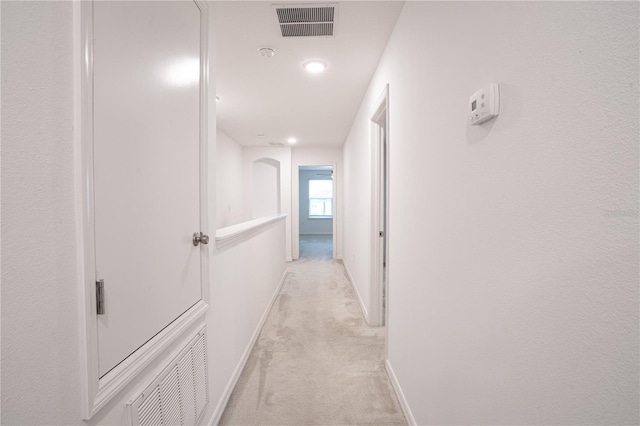 3850 Hampstead Ln, Lakeland, FL 33810 - hall with light carpet and recessed lighting