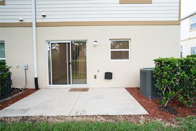 3850 Hampstead Ln, Lakeland, FL 33810 - back of property featuring a patio area and stucco siding