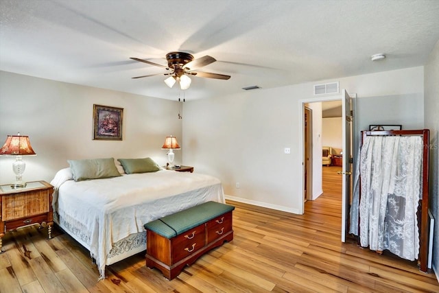 130 Evergreen Dr, Auburndale, FL 33823 - bedroom with light wood-style flooring and ceiling fan