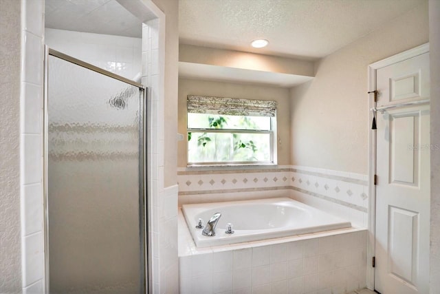130 Evergreen Dr, Auburndale, FL 33823 - full bathroom with a garden tub and a shower stall