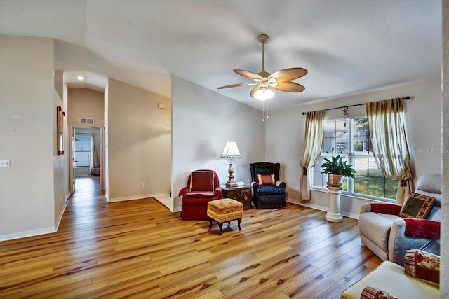 130 Evergreen Dr, Auburndale, FL 33823 - sitting room featuring light wood-type flooring, a ceiling fan, and vaulted ceiling