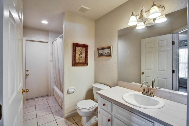 130 Evergreen Dr, Auburndale, FL 33823 - bathroom with a textured wall, vanity, tile patterned floors, and shower / bath combo