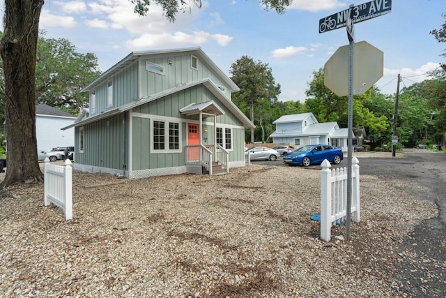 302 NW 7th Ter, Gainesville, FL 32601 - view of front of house with board and batten siding