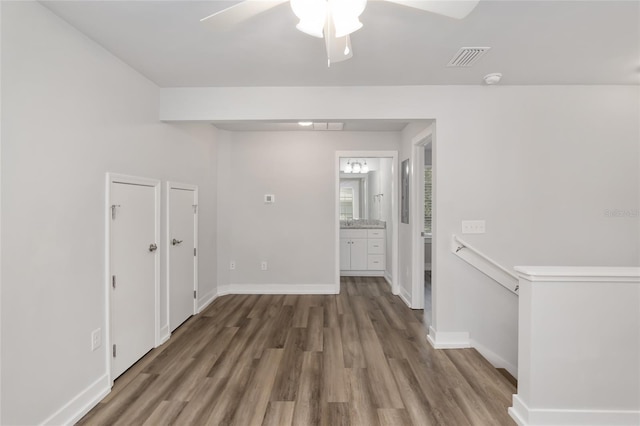 302 NW 7th Ter, Gainesville, FL 32601 - empty room featuring wood finished floors and ceiling fan
