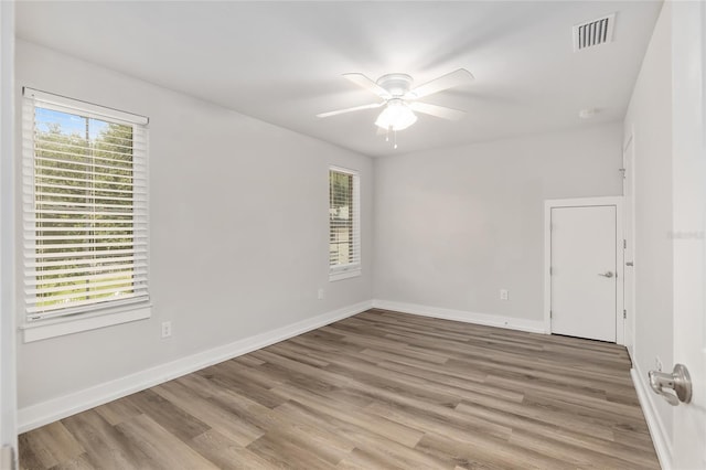 302 NW 7th Ter, Gainesville, FL 32601 - unfurnished room featuring ceiling fan and light wood finished floors