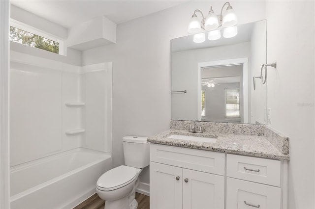 302 NW 7th Ter, Gainesville, FL 32601 - full bathroom with vanity, ceiling fan, tub / shower combination, and wood finished floors