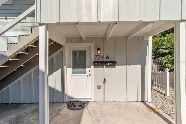 302 NW 7th Ter, Gainesville, FL 32601 - property entrance with board and batten siding