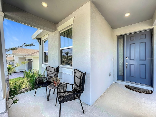 2044 Keystone Pass Blvd, Minneola, FL 34715 - property entrance with stucco siding