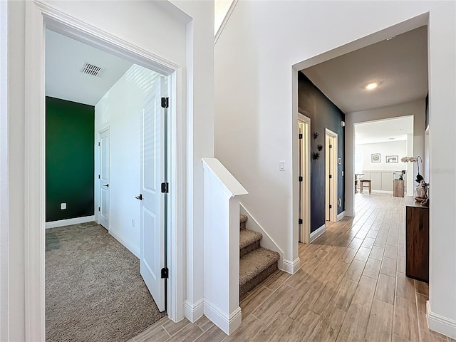 2044 Keystone Pass Blvd, Minneola, FL 34715 - hall featuring light wood-style floors and stairway