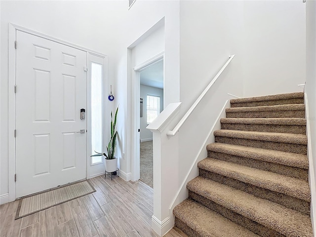 2044 Keystone Pass Blvd, Minneola, FL 34715 - foyer entrance featuring stairs and wood finished floors