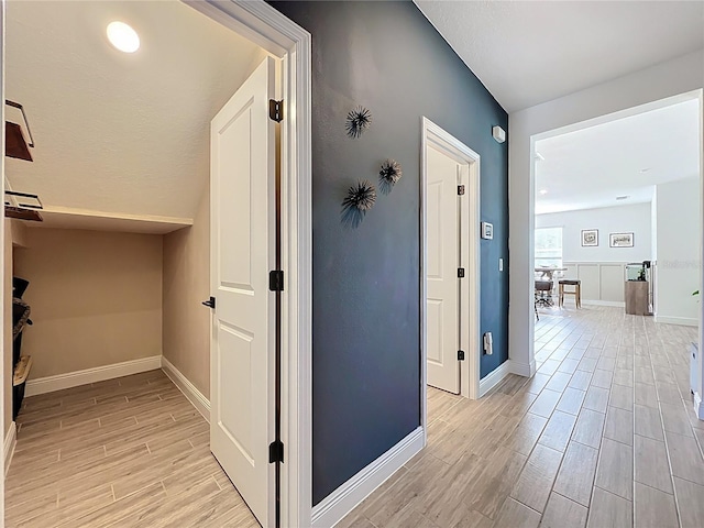 2044 Keystone Pass Blvd, Minneola, FL 34715 - hallway with wood finish floors and baseboards