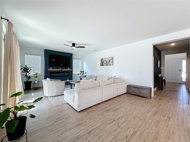 2044 Keystone Pass Blvd, Minneola, FL 34715 - living room featuring light wood finished floors and ceiling fan