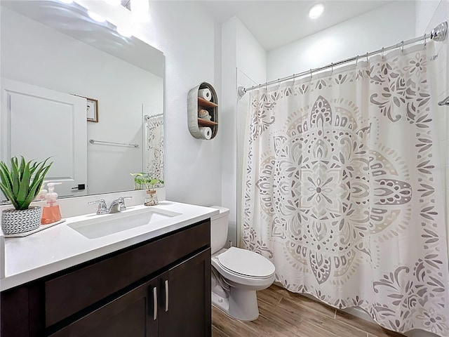 2044 Keystone Pass Blvd, Minneola, FL 34715 - full bath featuring wood finished floors, vanity, and curtained shower
