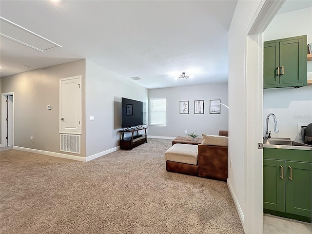 2044 Keystone Pass Blvd, Minneola, FL 34715 - living room with light carpet and attic access