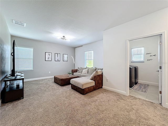 2044 Keystone Pass Blvd, Minneola, FL 34715 - living room featuring light colored carpet and a textured ceiling
