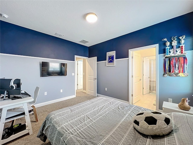 2044 Keystone Pass Blvd, Minneola, FL 34715 - bedroom with light carpet, a desk, and ensuite bath