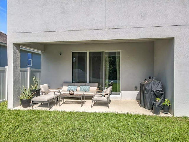 2044 Keystone Pass Blvd, Minneola, FL 34715 - back of property featuring outdoor lounge area, a patio, and stucco siding