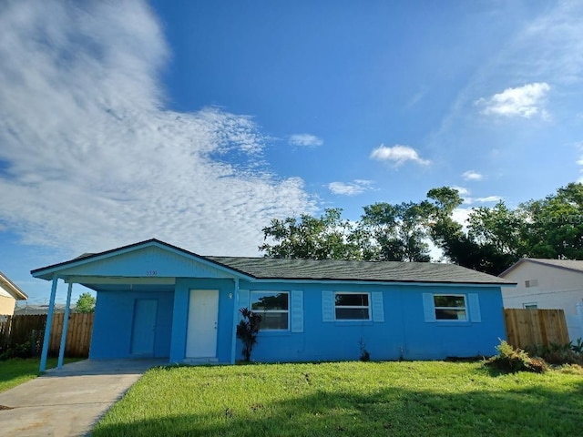 5390 Botany Ct, Orlando, FL 32811 - ranch-style home featuring concrete driveway and an attached carport