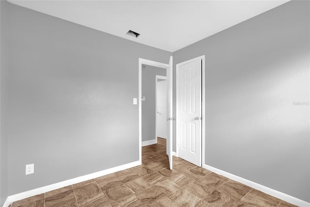 5390 Botany Ct, Orlando, FL 32811 - unfurnished room with baseboards