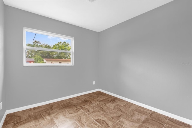 5390 Botany Ct, Orlando, FL 32811 - empty room featuring baseboards