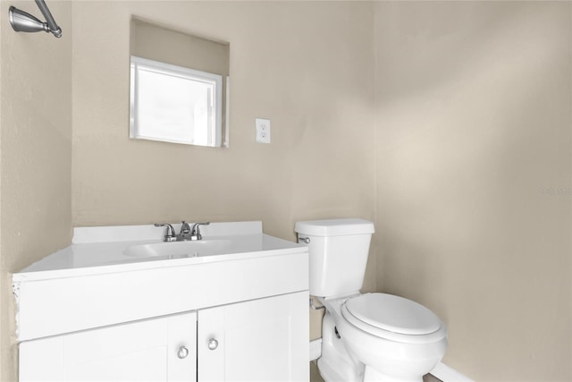 5390 Botany Ct, Orlando, FL 32811 - half bath featuring vanity and toilet