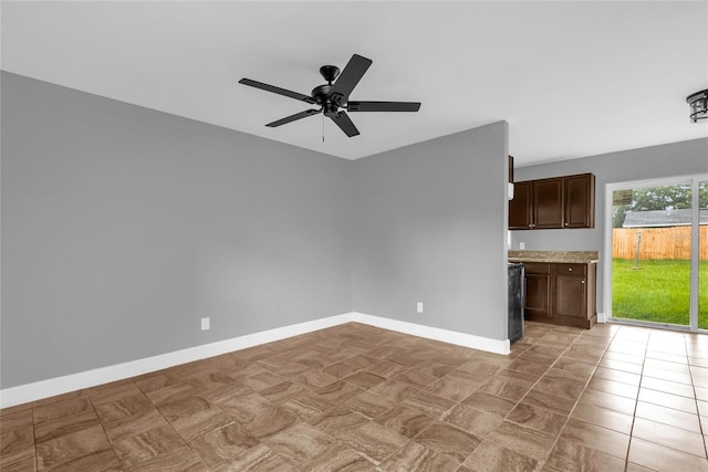 5390 Botany Ct, Orlando, FL 32811 - empty room with baseboards and a ceiling fan