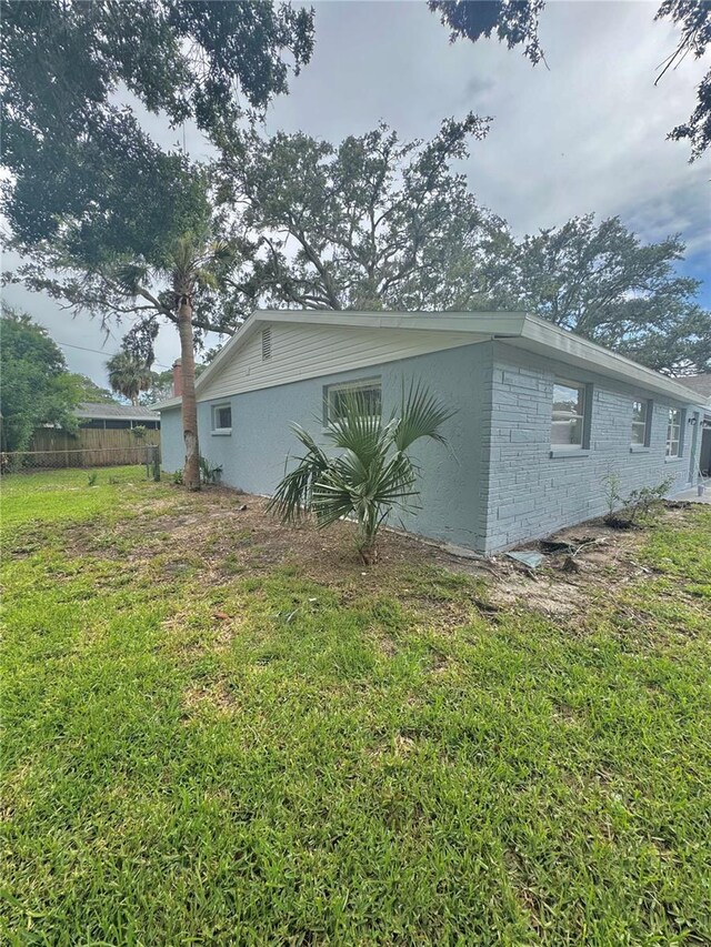 4934 Avery Rd, New Port Richey, FL 34652 - view of home's exterior with brick siding