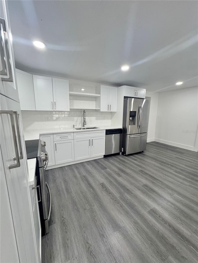 4934 Avery Rd, New Port Richey, FL 34652 - kitchen featuring stainless steel appliances, white cabinets, wood finished floors, open shelves, and recessed lighting