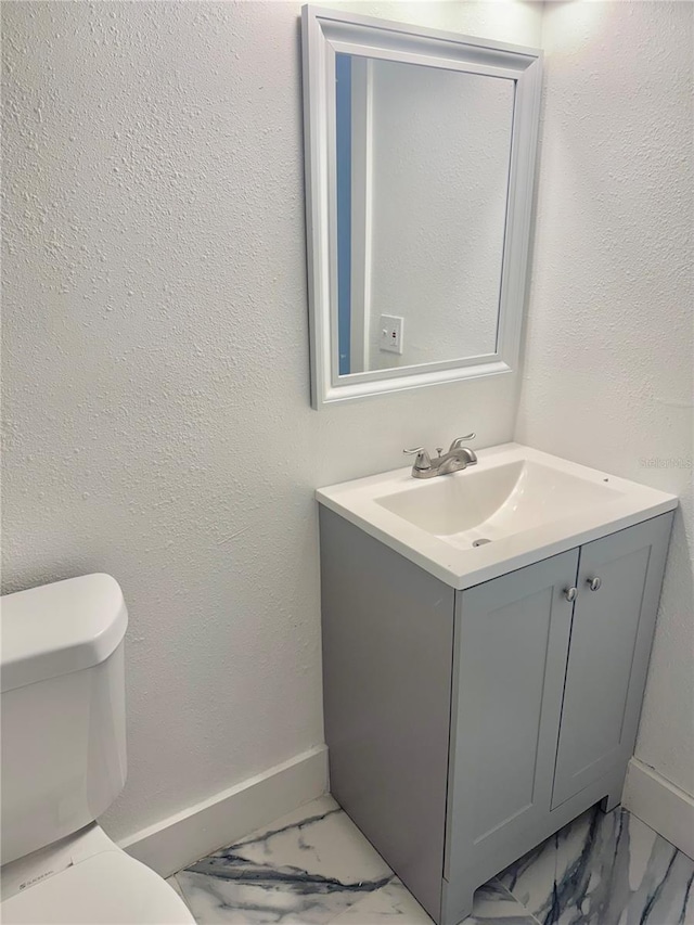 4934 Avery Rd, New Port Richey, FL 34652 - bathroom featuring marble look tile flooring and vanity