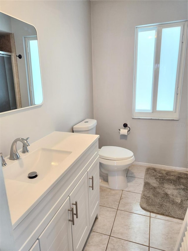 22481 Westchester Blvd Unit A19, Punta Gorda, FL 33980 - bathroom with vanity, tile patterned floors, and a shower with shower door