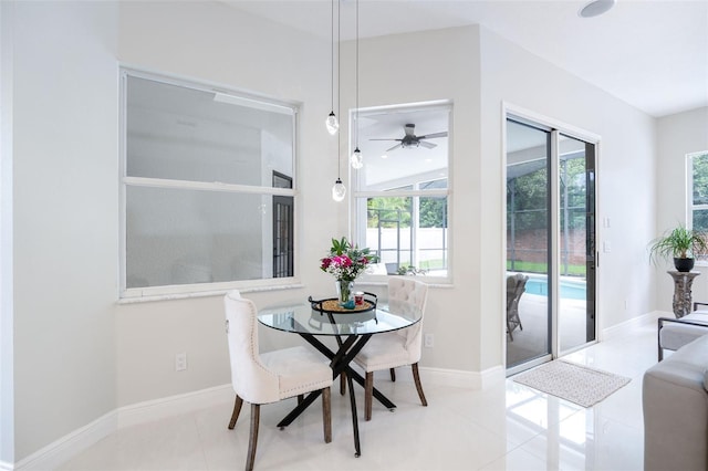 9844 Montclair Cir, Apopka, FL 32703 - dining space with plenty of natural light and a ceiling fan