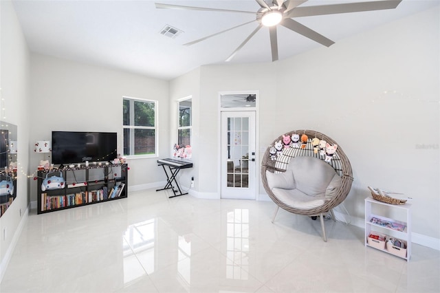 9844 Montclair Cir, Apopka, FL 32703 - sitting room featuring a ceiling fan, tile patterned floors, and french doors