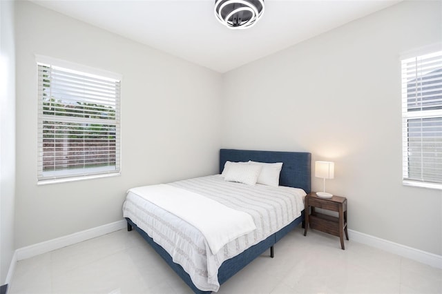 9844 Montclair Cir, Apopka, FL 32703 - tiled bedroom with baseboards