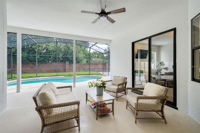 9844 Montclair Cir, Apopka, FL 32703 - view of patio / terrace with outdoor lounge area, a ceiling fan, and glass enclosure