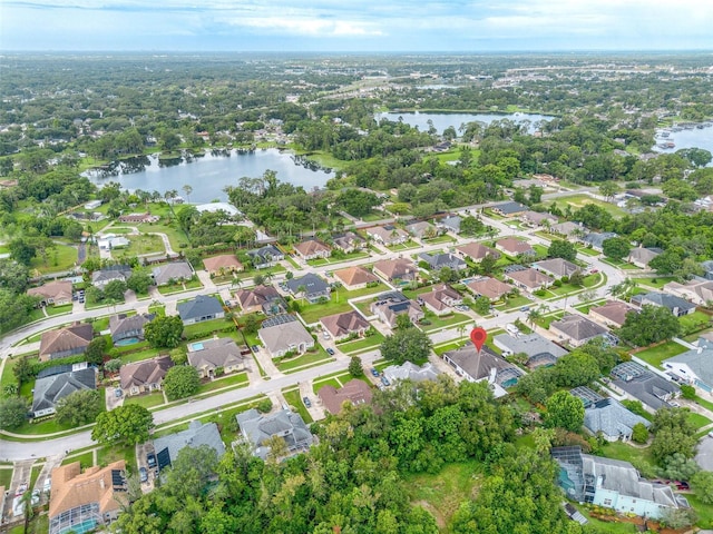 9844 Montclair Cir, Apopka, FL 32703 - aerial overview of property's location with a nearby body of water and nearby suburban area