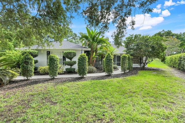 11442 Beggs Ct, Clermont, FL 34711 - view of front of home featuring a front yard and stucco siding