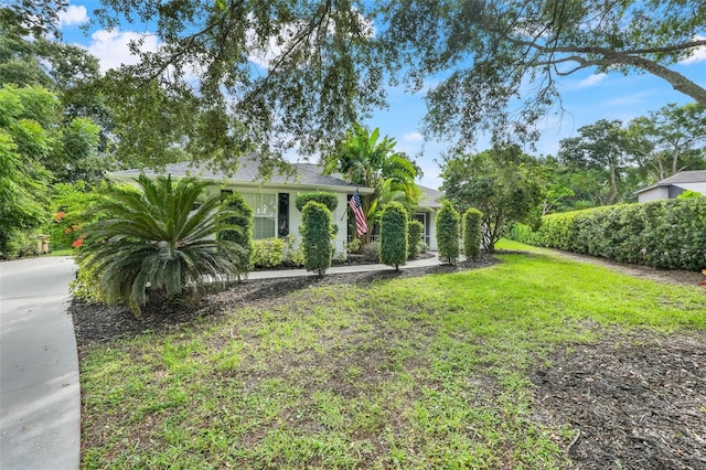 11442 Beggs Ct, Clermont, FL 34711 - view of front of property with a front lawn
