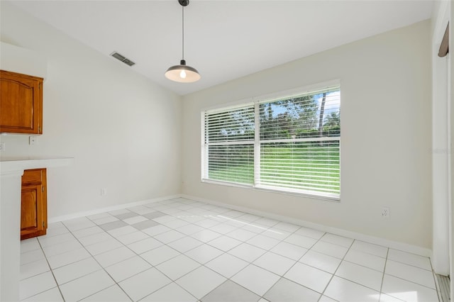 11442 Beggs Ct, Clermont, FL 34711 - unfurnished dining area with baseboards and vaulted ceiling