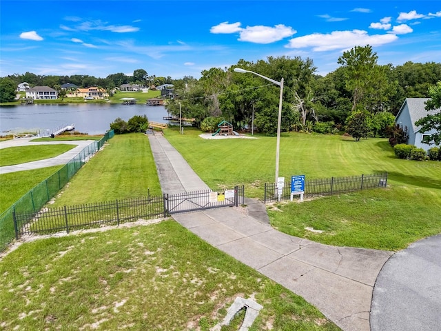 11442 Beggs Ct, Clermont, FL 34711 - view of property's community featuring a gate and a water view