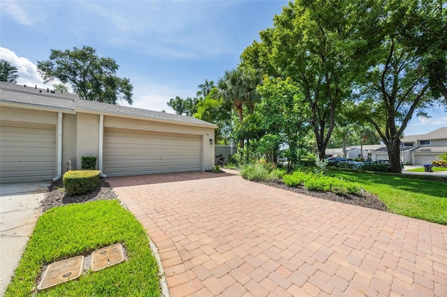 7755 High Pine Rd, Orlando, FL 32819 - garage with decorative driveway